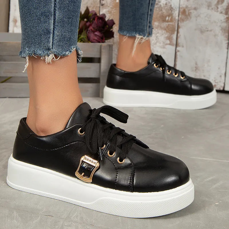 Lace-up flats with metal buckle design, round toe, artificial PU upper, rubber sole, front tie, available in black