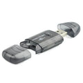 Creative transparent plastic USB card reader with LED light option on a desk
