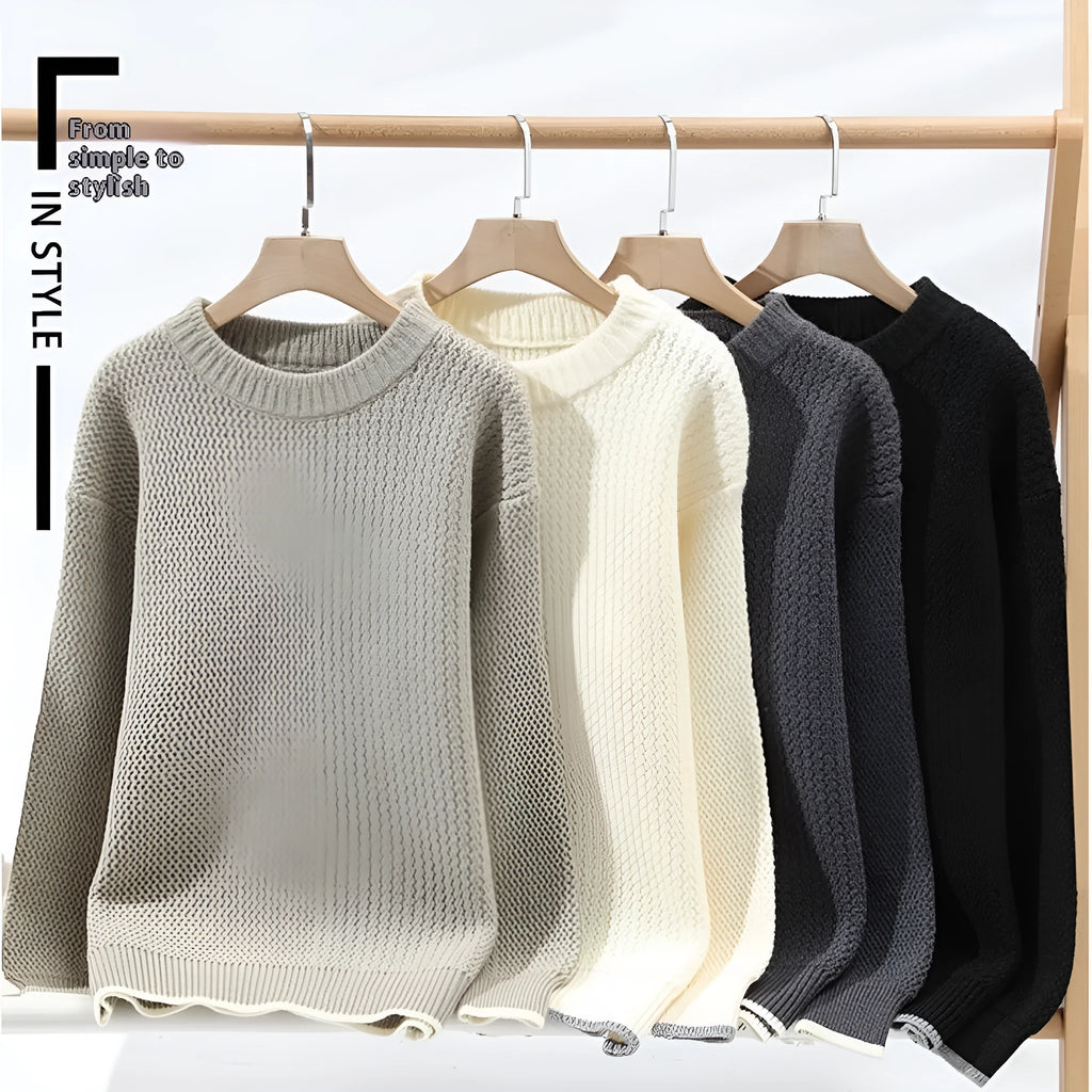 A man's grey loose-fit round-neck long-sleeve casual pullover sweater on a plain background.