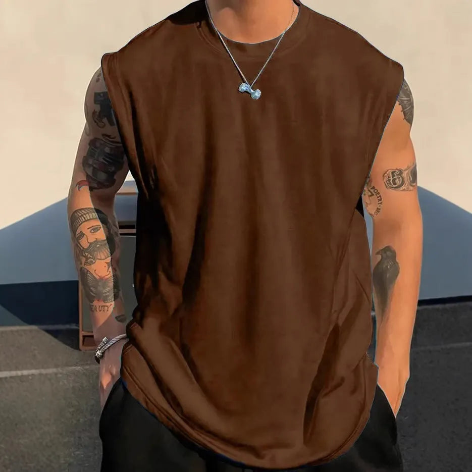 Men's loose fit solid colour cotton tank top shown in apricot, available in sizes up to 5XL.
