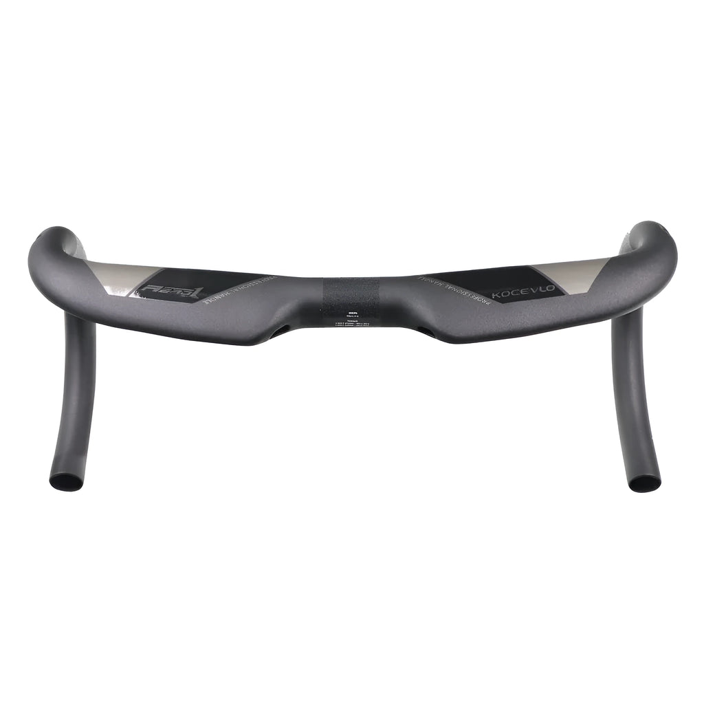 Matt black carbon fibre bent road bicycle handlebar shown from above.