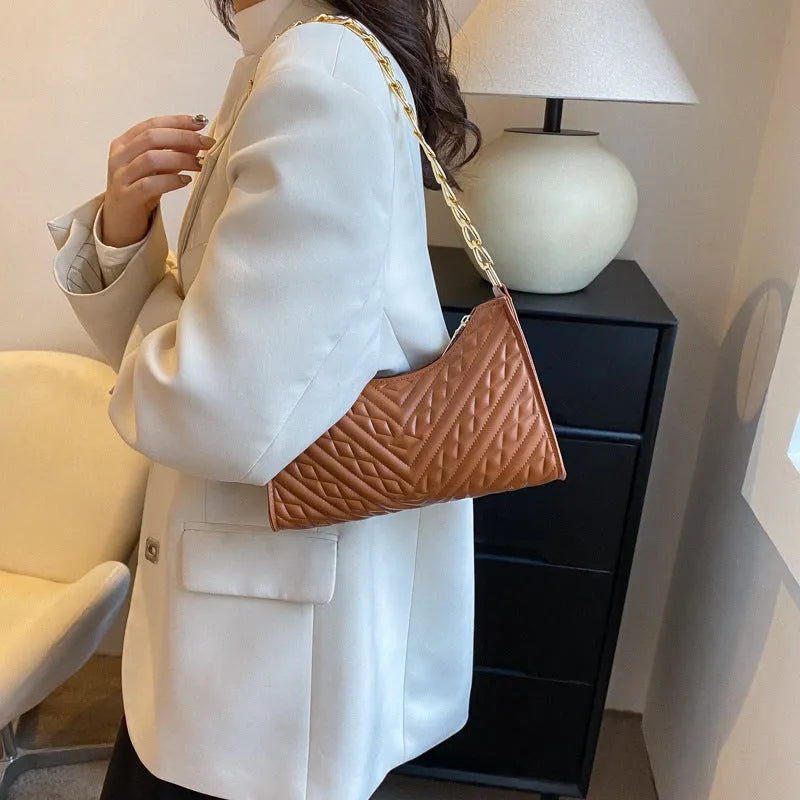 PU leather pleated chain baguette shoulder bag in vertical square shape with soft surface texture
