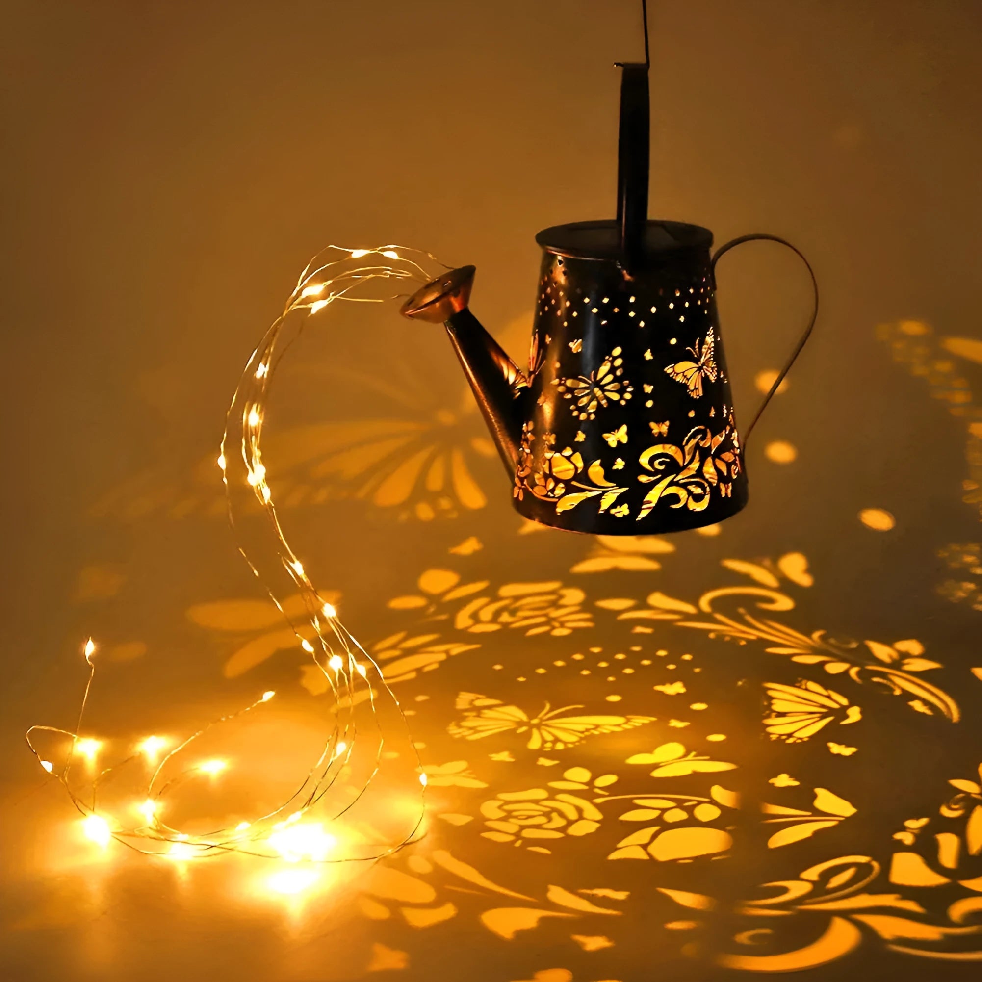 Solar-powered iron butterfly garden lamp with warm white LED lighting for outdoor decorative use