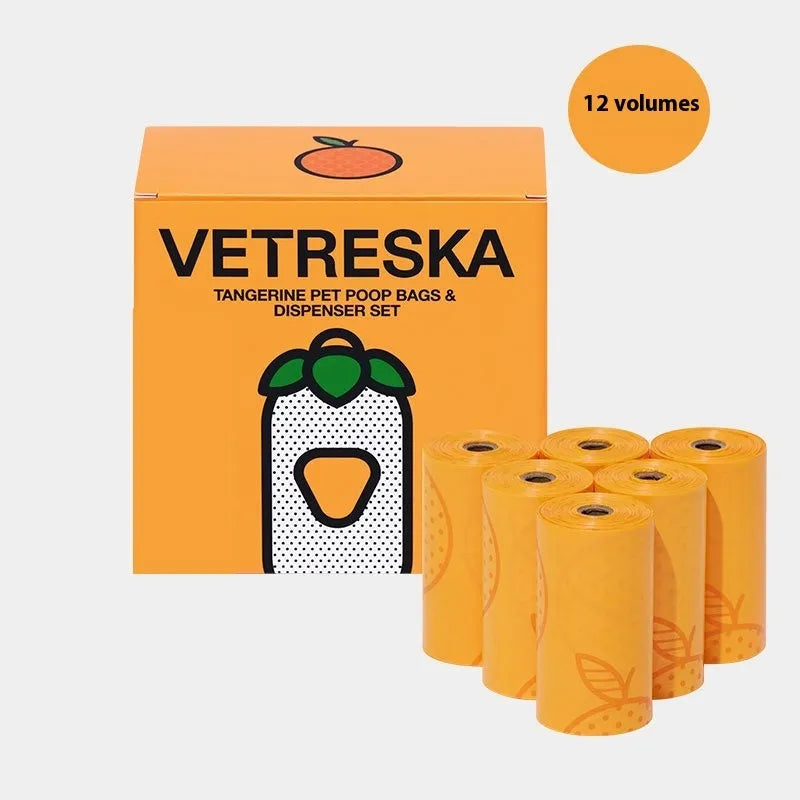 Portable dog waste bag dispenser capsule with scented inner bags in strawberry, orange, and cherry blossom options