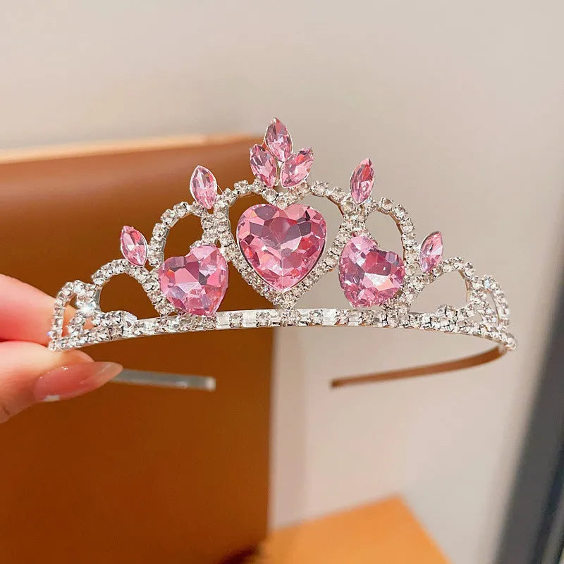Children's electroplated alloy crown headband headdress in pink, light blue, and light purple crystal colours.