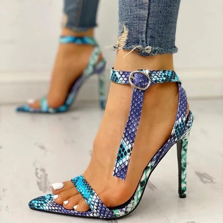 Blue women's high heels with snake print, buckle fastening, and pointed toe.