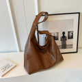 Soft leather casual shoulder bag with large capacity in street trend styling