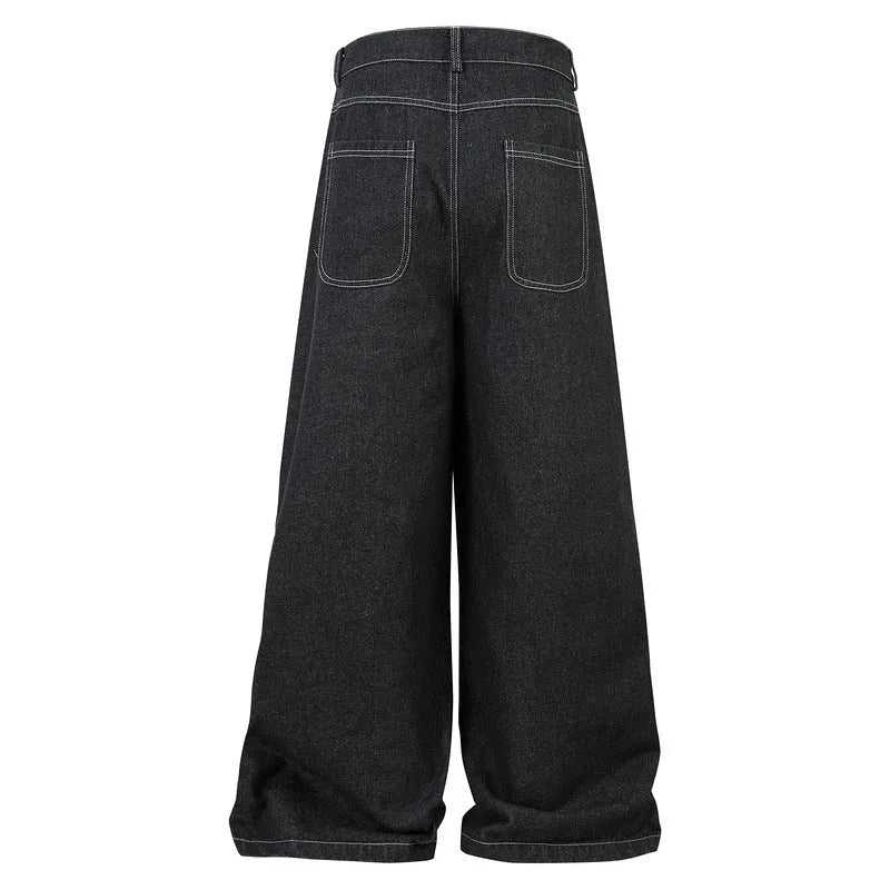 Black pleated work jeans with multiple pockets, featuring a zip fly and mid-waist design.