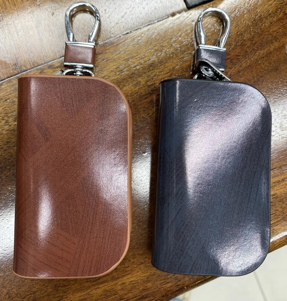 Black and brown genuine leather car key case with frosted finish showing internal dimensions.