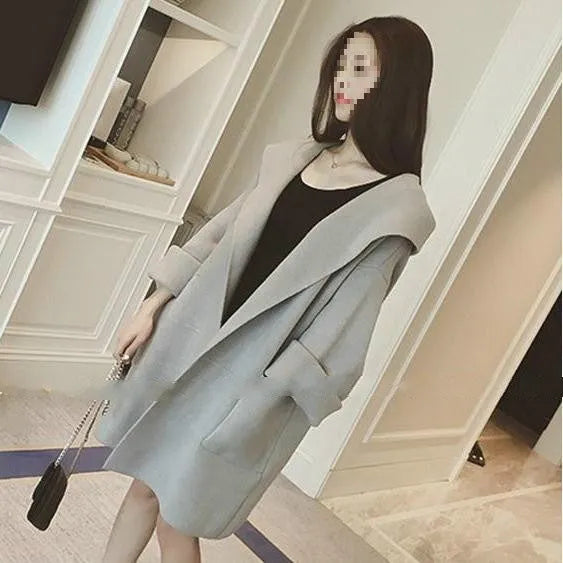 Plus size women's thin long sleeve coat in loose fit with lace detailing.