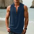 Men's mint green cotton linen sleeveless casual shirt laid flat, showing collar and front button placket.