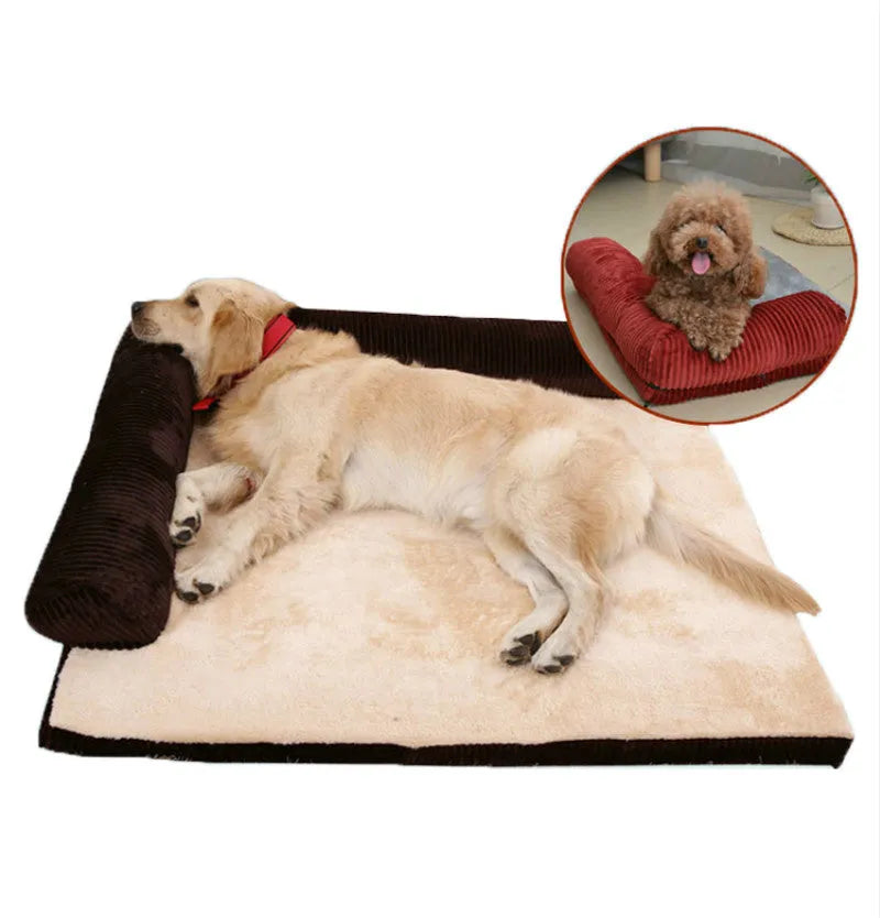 Grey corduroy dog sofa bed with raised sides and a non-slip base on a wooden floor.
