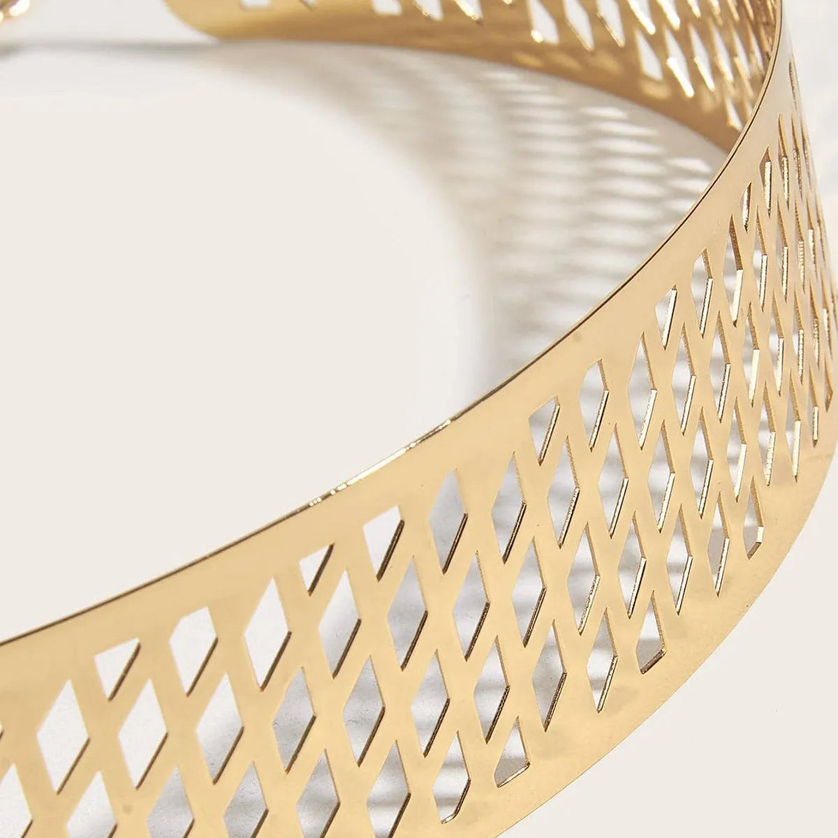 Gold thick leather look waist belt with alloy buckle, shown with hook fastening, length 105cm.