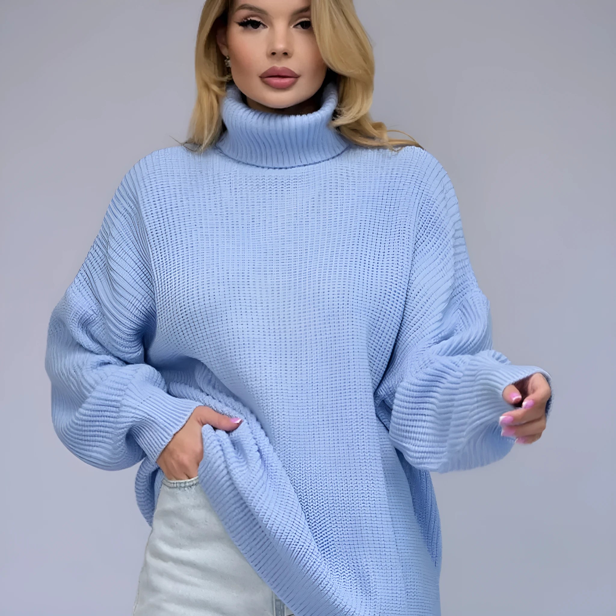 Women's imitation cashmere pullover sweater with 3D pattern in loose fit, shown in sky blue colour