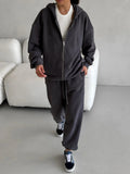 Red loose fit street style coat and trousers two-piece set on a hanger.