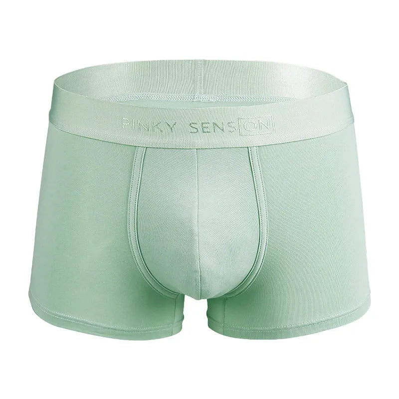Men's solid colour cotton boxer shorts showing black white silver grey light green options