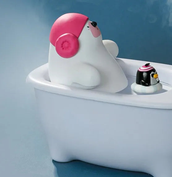 White USB-powered portable air humidifier and essential oil diffuser on a desk