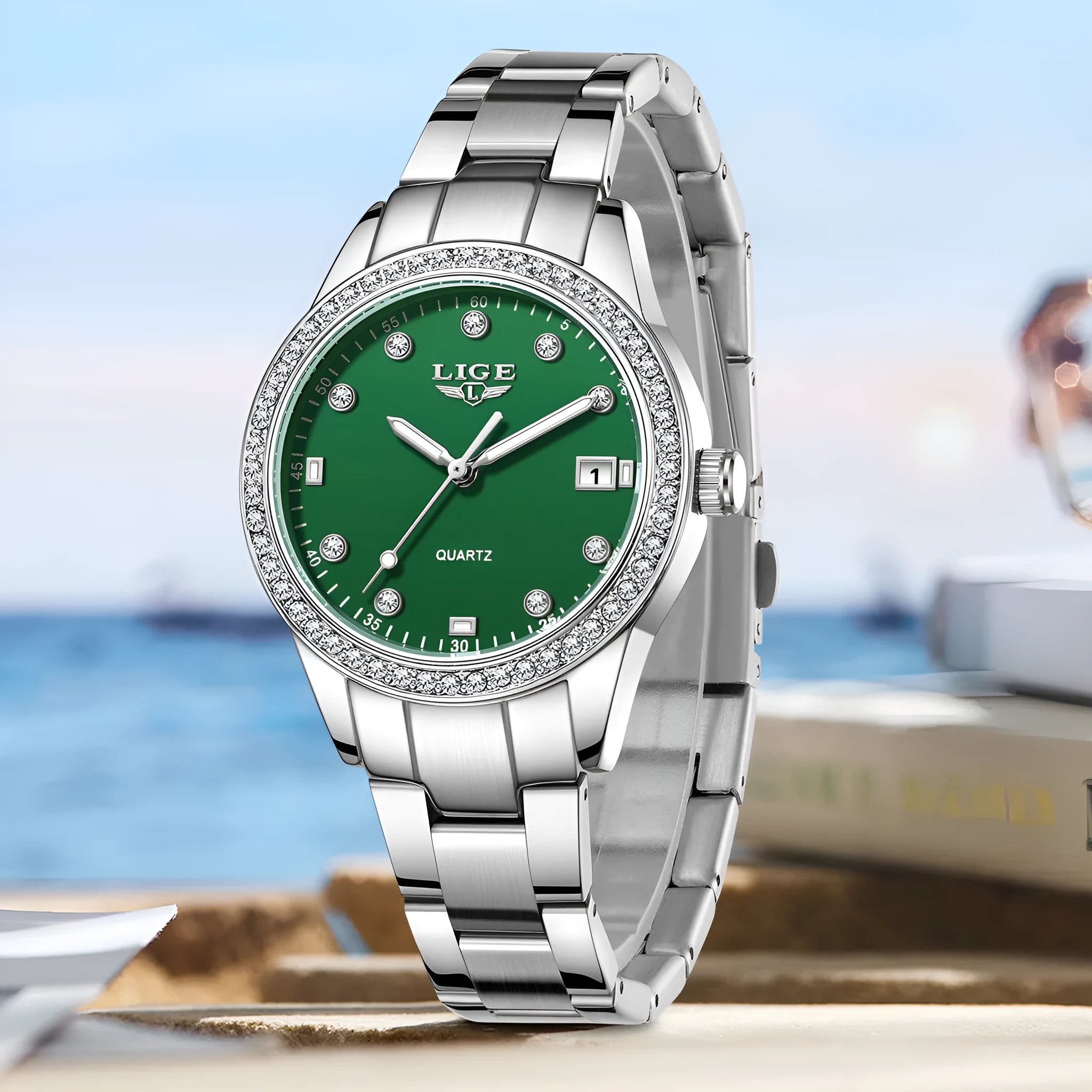Silver quartz watch with diamond encrusted dial and luminous hands on stainless steel strap