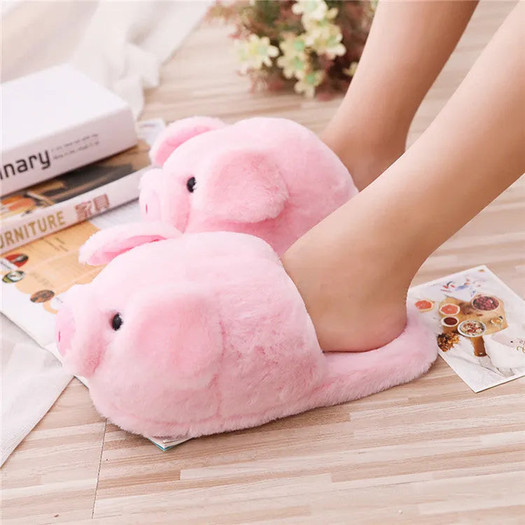 Pink pig floor slippers with short plush fabric and PP cotton filling showing size 36-39 options