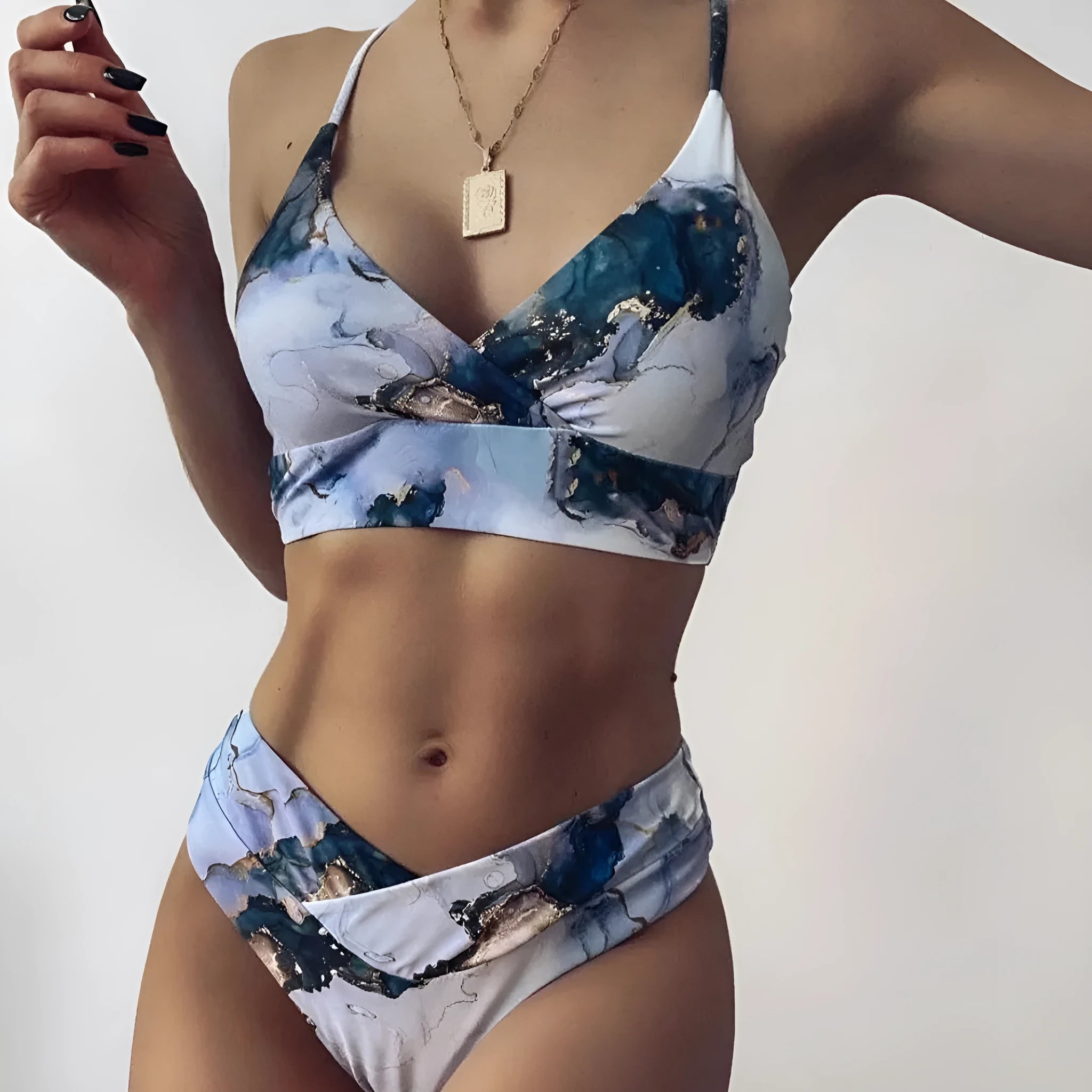 Women's marble print high-waist bikini set with U-neck top in separated swimwear design