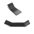 Mini tri-fold Bluetooth keyboard showing folded compact size with silver ABS plastic finish