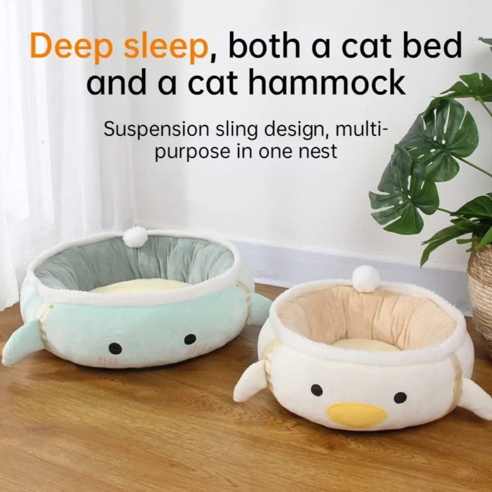 Green dinosaur-shaped cat bed shown both flat as a sofa and hanging as a hammock with straps