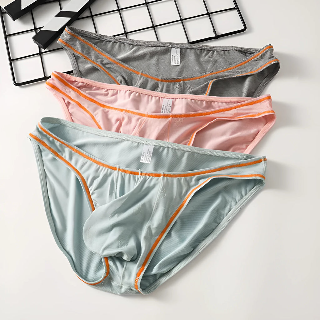 Men's ice silk modal butt-lift underwear in multiple colours showing seamless knitting construction