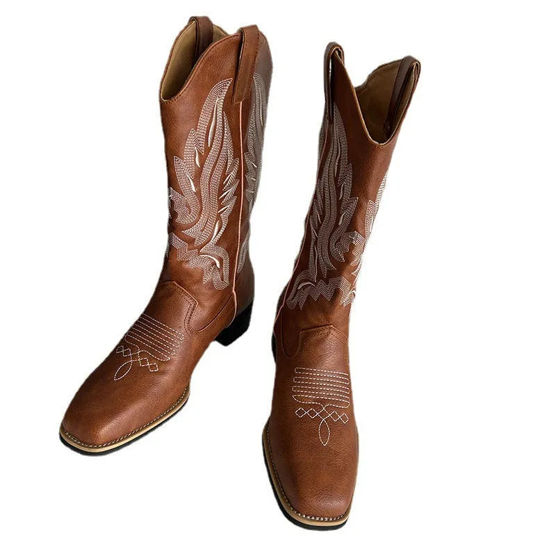 Brown women's embroidered Martin boots with mid-calf length, square heel, and round toe