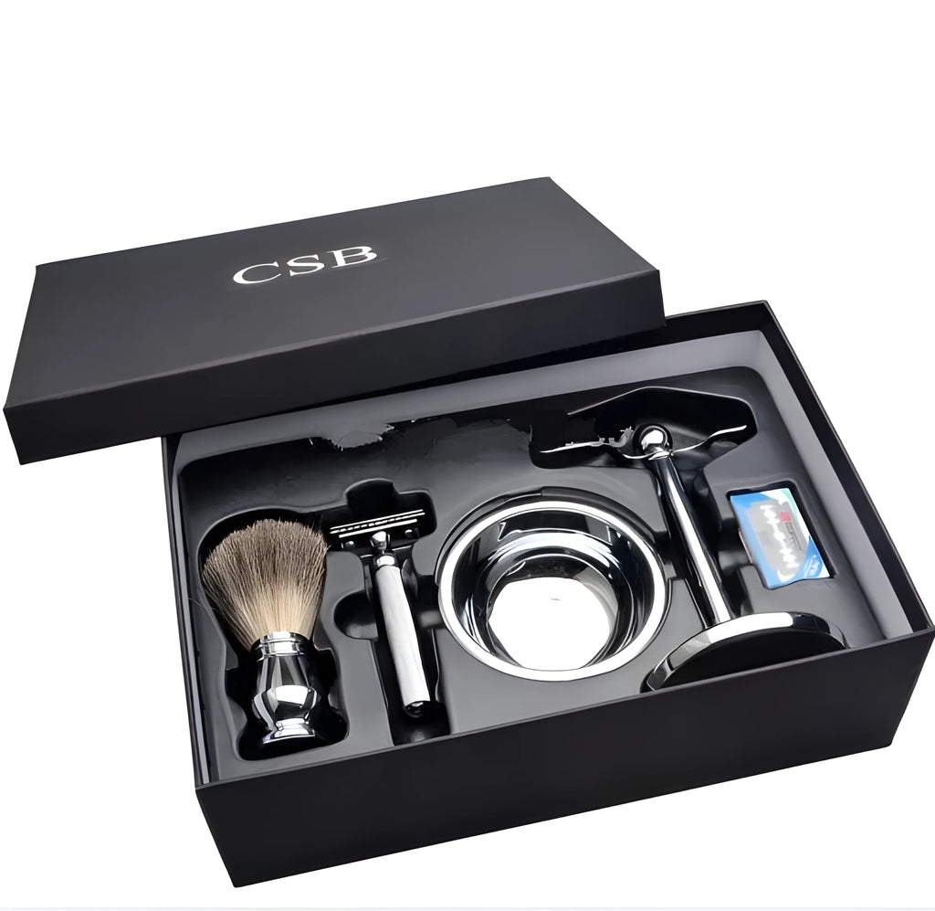 CSB men's shaving set with chrome double edge razor, badger hair brush on stand, zinc soap bowl, and blades in black box.