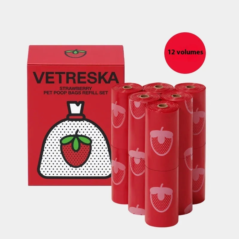 Portable dog waste bag dispenser capsule with scented inner bags in strawberry, orange, and cherry blossom options