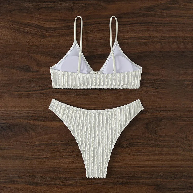 White women's V-neck swimsuit with separate top and shorts for beach or pool