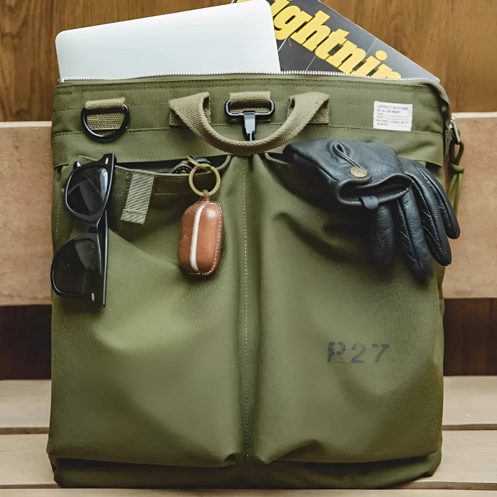 Retro style canvas crossbody messenger bag in charcoal black with zipper closure and shoulder strap
