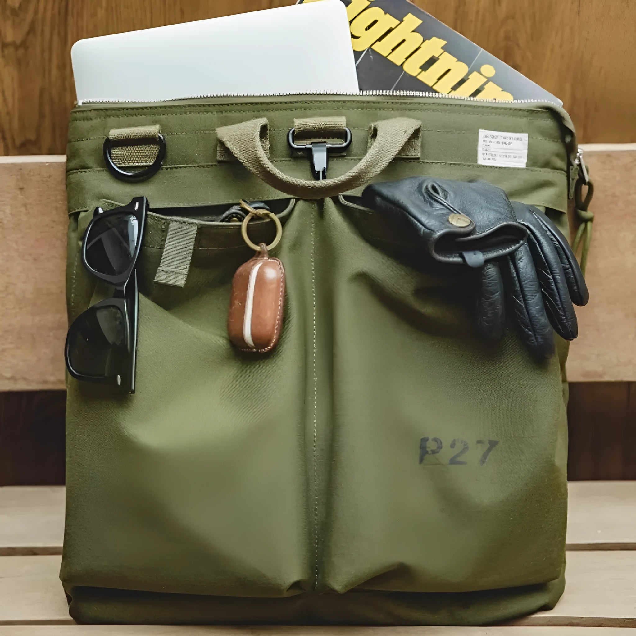 Retro style canvas crossbody messenger bag in charcoal black with zipper closure and shoulder strap