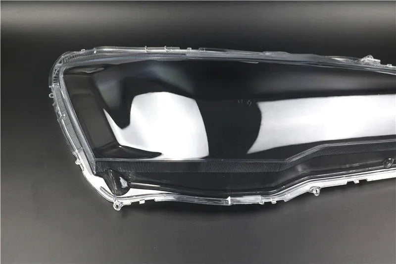 Transparent plastic headlight housing covers for main driver and co-pilot vehicle lamps