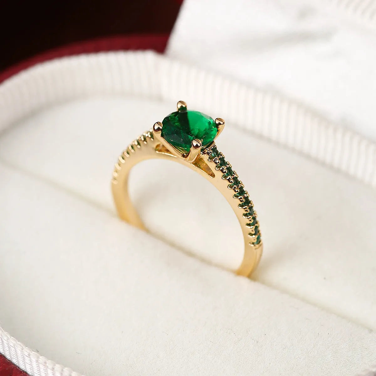 Zircon hexagon ring with geometric design showing electroplated colour options on copper base
