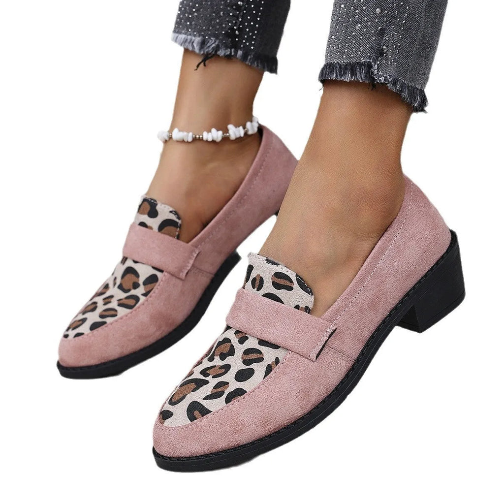 Leopard print suede slip-on shoes with a chunky mid heel and pointed toe on a rubber sole