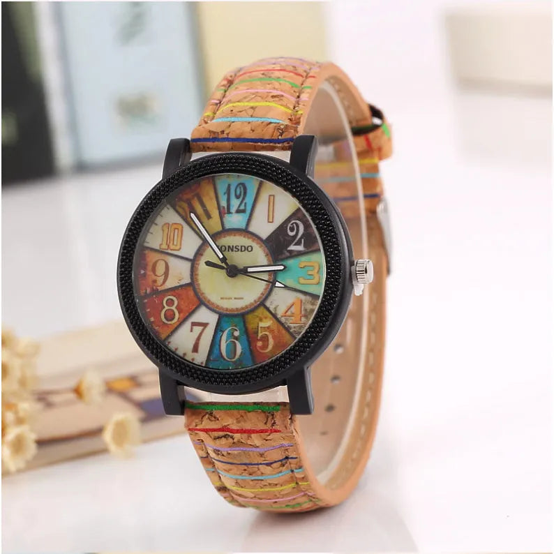Women's vintage style quartz watch with brown leather strap and 37mm round dial