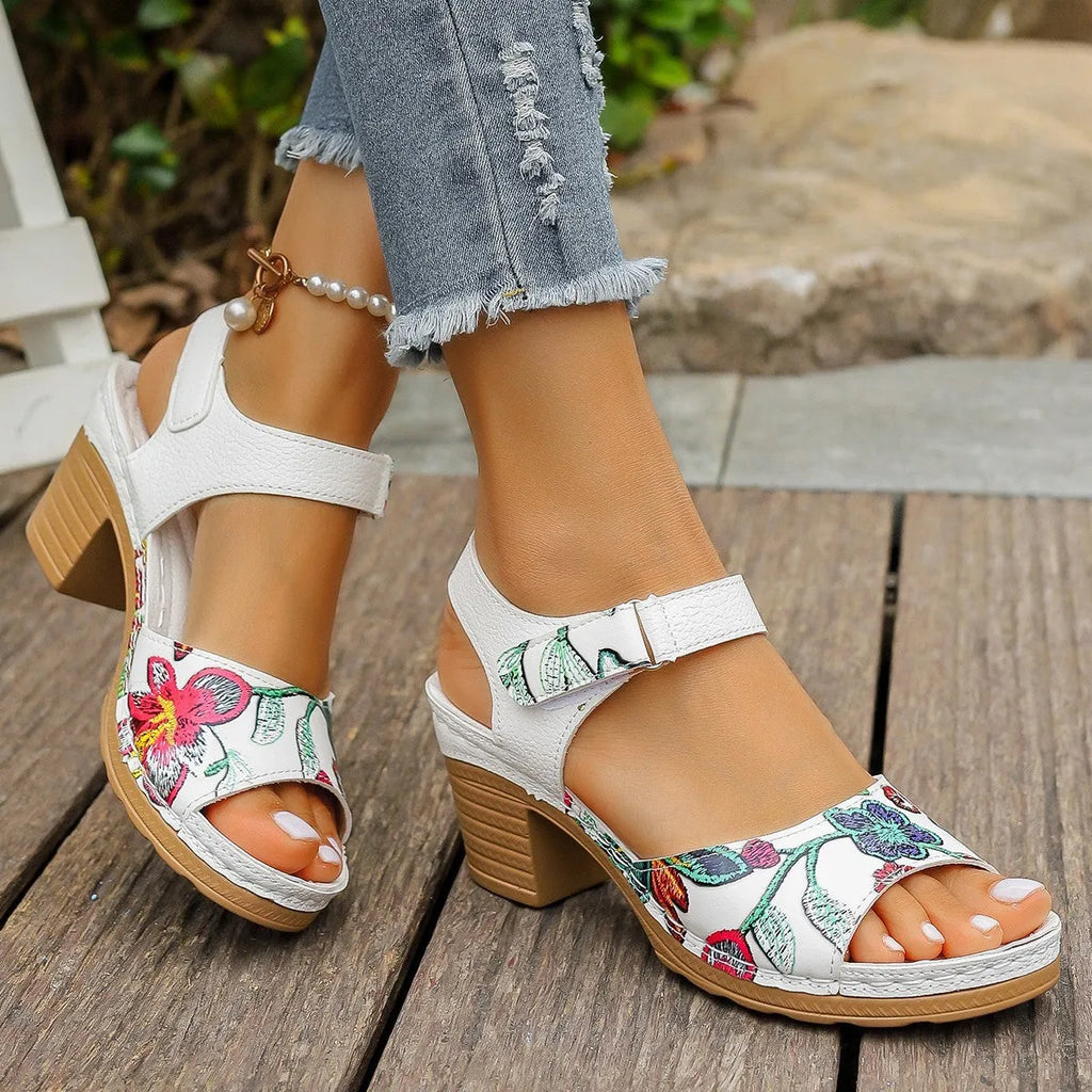 White women's high heel sandals with Velcro buckle closure and rubber sole