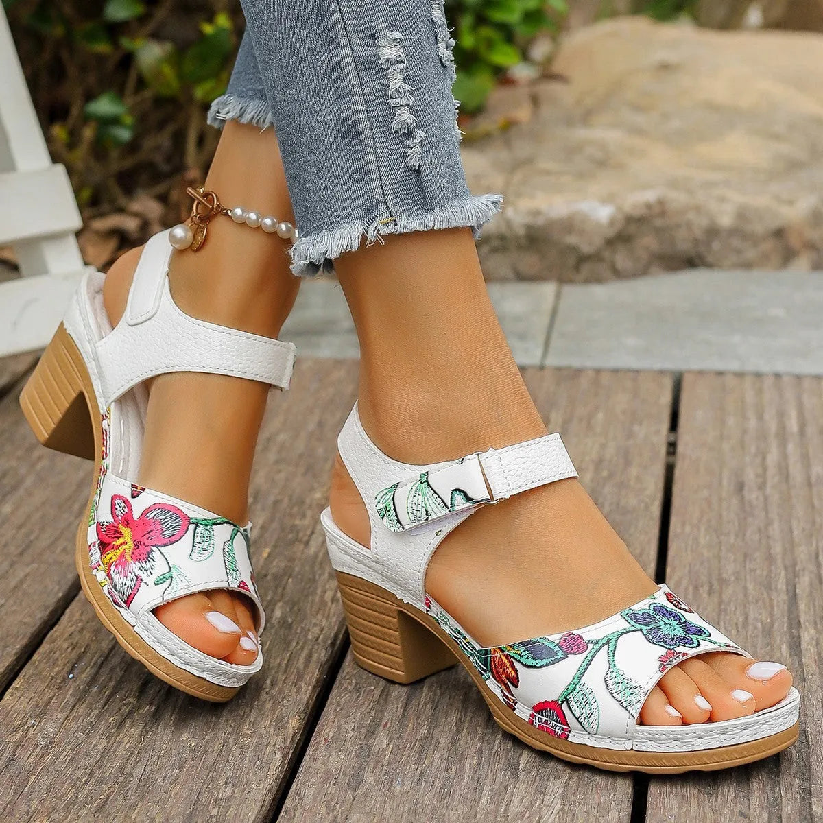 White women's high heel sandals with Velcro buckle closure and rubber sole