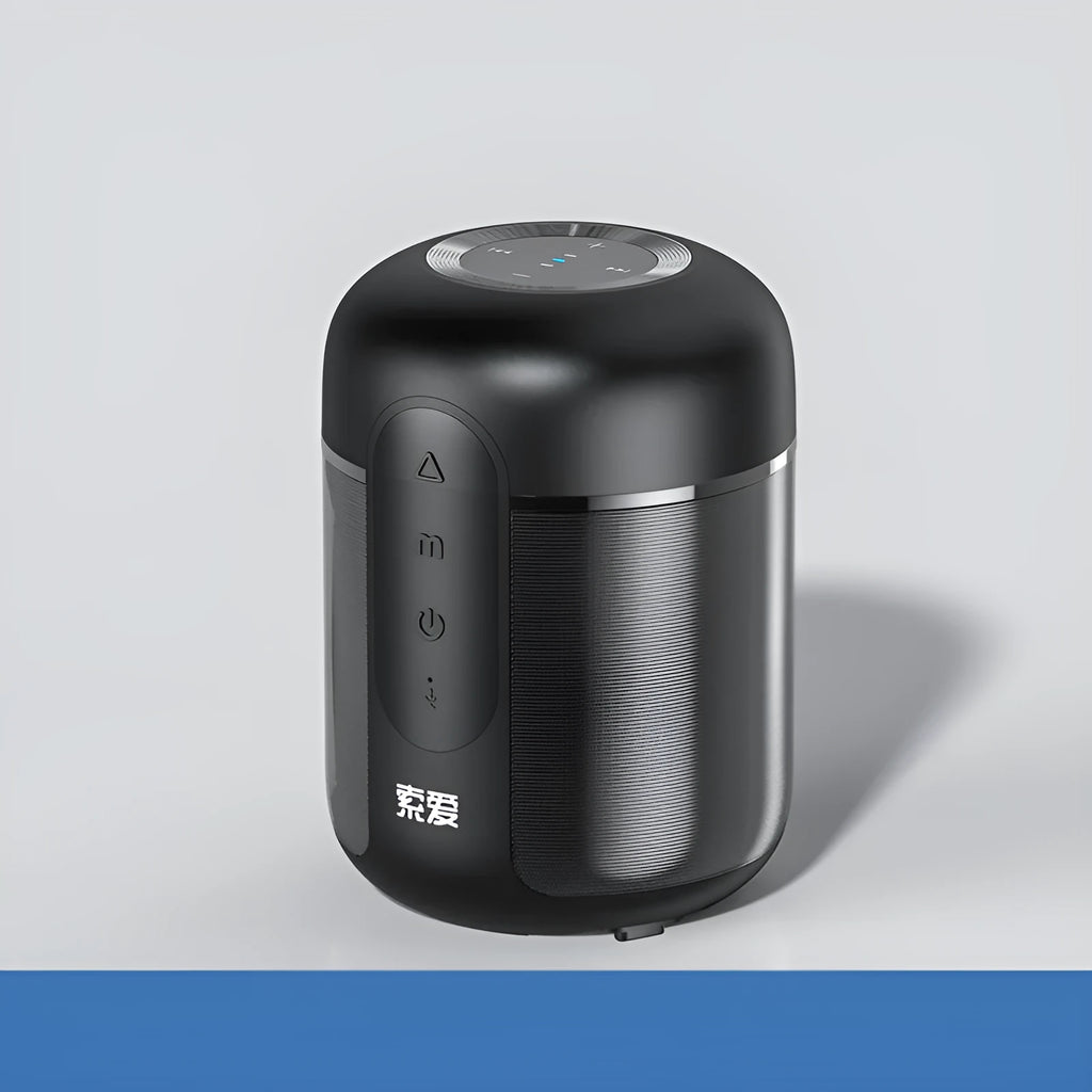 Black portable Bluetooth speaker showing front grill and controls.