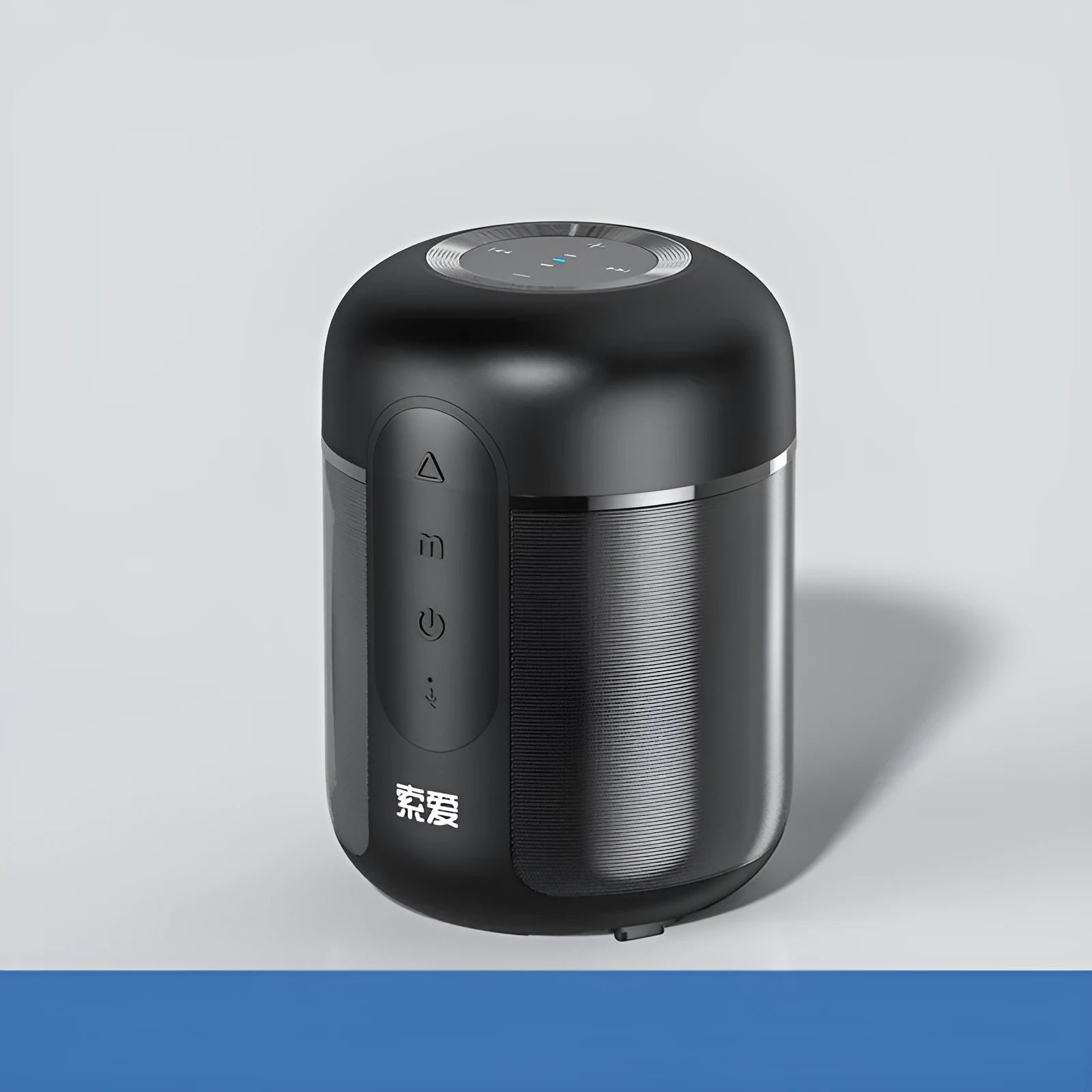 Black portable Bluetooth speaker showing front grill and controls.