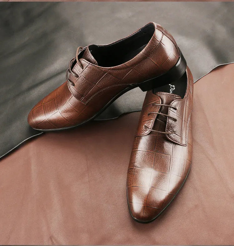 Men's black and brown checkered patterned cow leather derby shoes with pointed toe on a rubber sole.