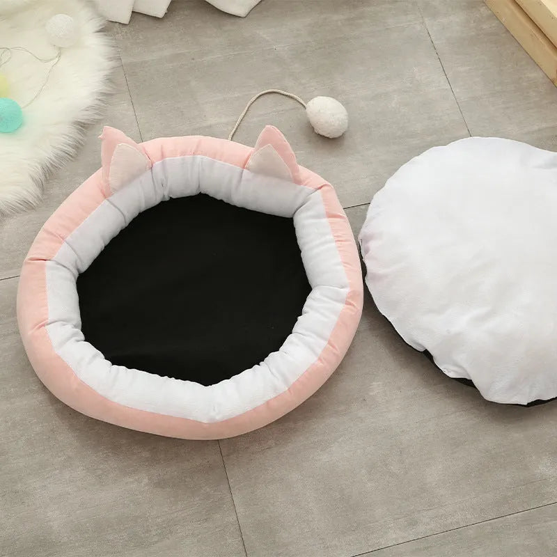Suede cat litter mat with cat ears design, 36cm diameter, in pink and white colour