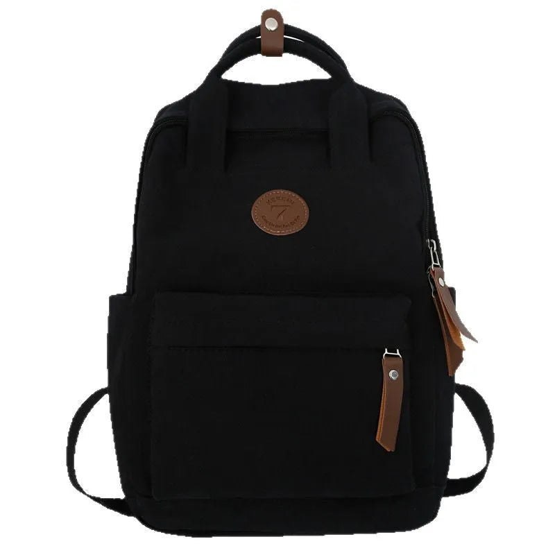 Black Oxford cloth leisure backpack with curved shoulder straps shown front view