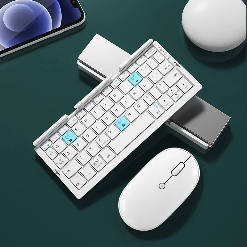Silver white foldable Bluetooth keyboard open with tablet on stand and closed for pocket storage