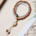 Sandalwood and opal Tibetan beads bracelet with polished double rings in Barbie colour