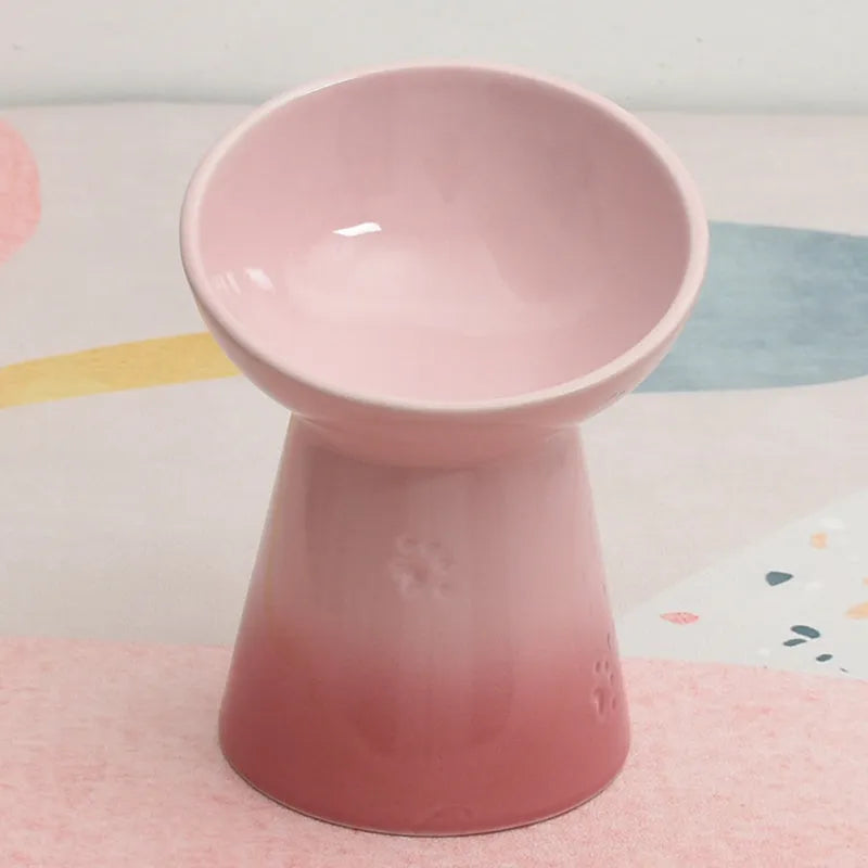 Ceramic pet bowl with high foot design showing anti-tumble stability feature