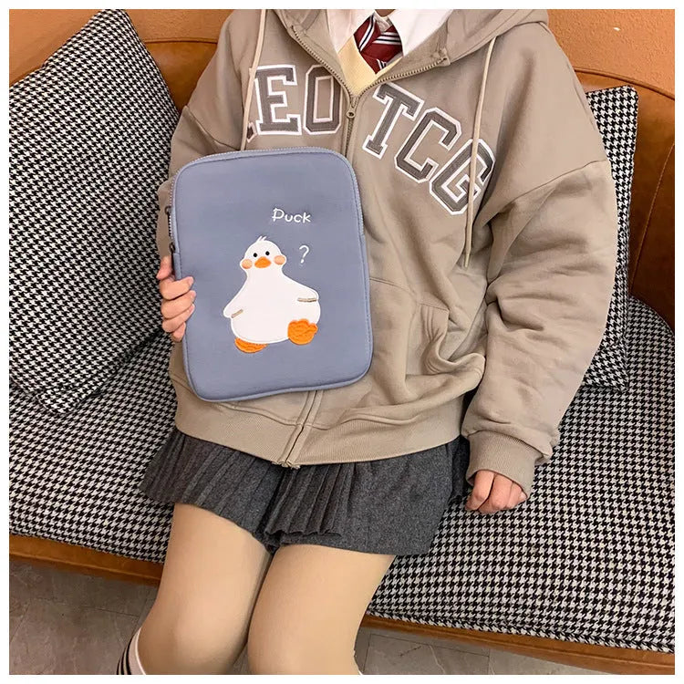Cotton tablet case with cartoon duck embroidery design in blue or green colours with zipper closure