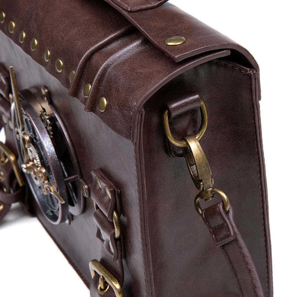Bronze steampunk industrial retro shoulder bag with metal hardware and square pillow shape.