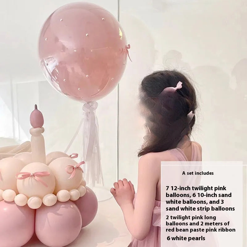 Round shaped balloon bouquet cake decoration DIY kit with colourful balloons arranged as party centrepiece